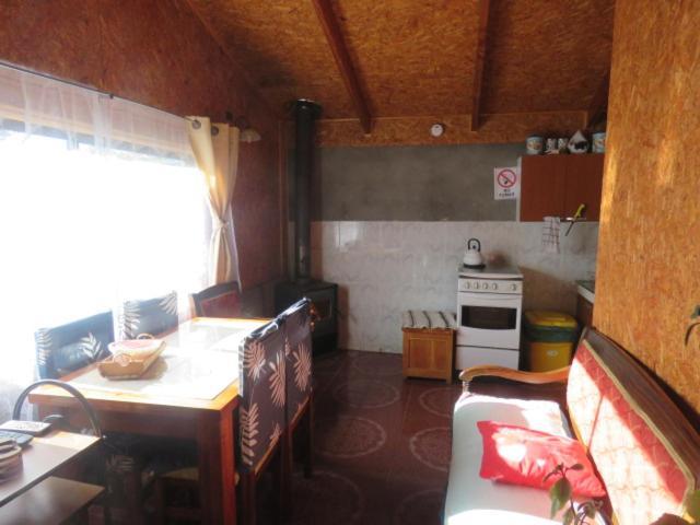 Hostal Y Cabanas Peumayen Пуэрто-Гуадаль Экстерьер фото